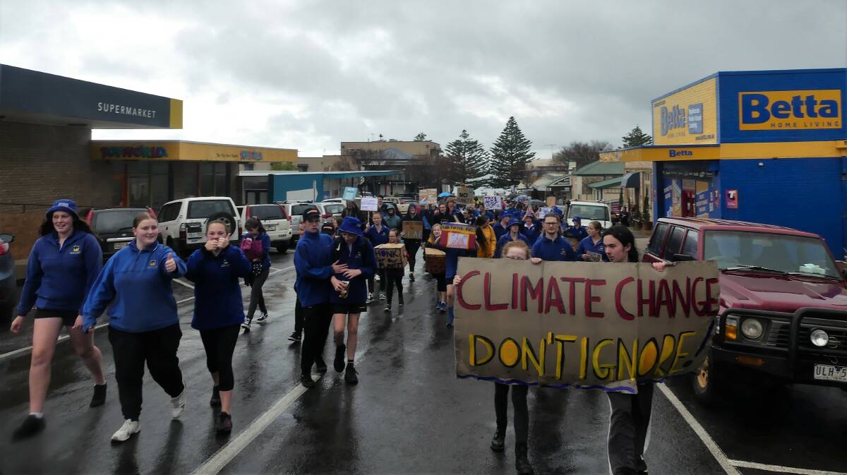 Kangaroo Island students take to the streets of Kingscote calling for action climate change. 