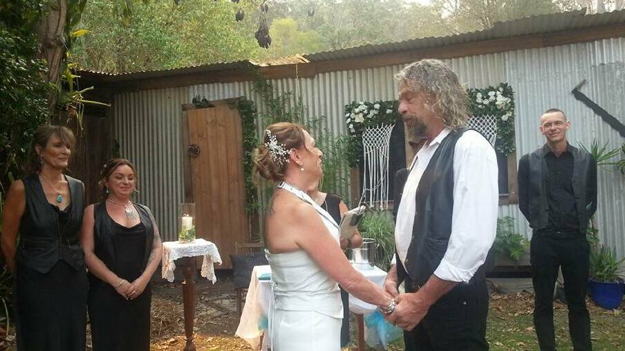 Mick Rourke and Christine Bannister of Telegraph Point tied the knot as planned, even as fires continued to burn near their property. 