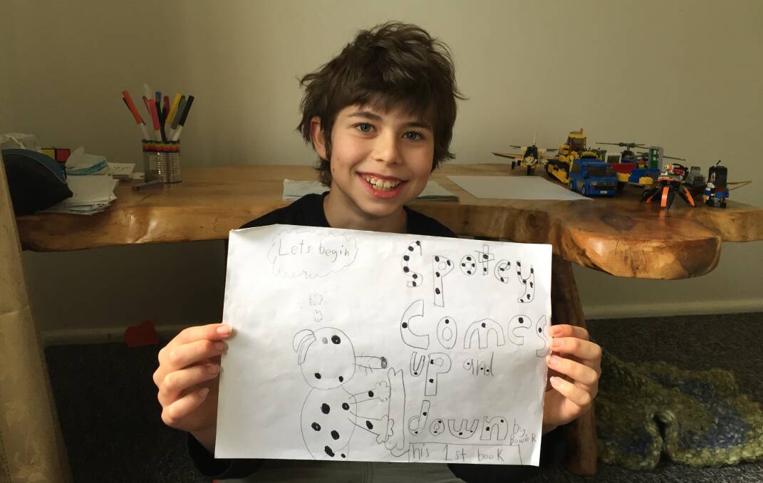 Bowie Reynolds with a draft of the front page of his comic book based on the adventures of Spotty the dog.