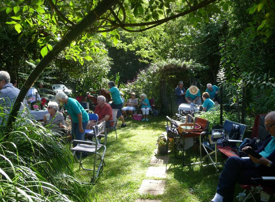 Tranquil: Gloucester Club members enjoy the serenity of Terry and Brian Hardwick's Garden. Photo supplied.