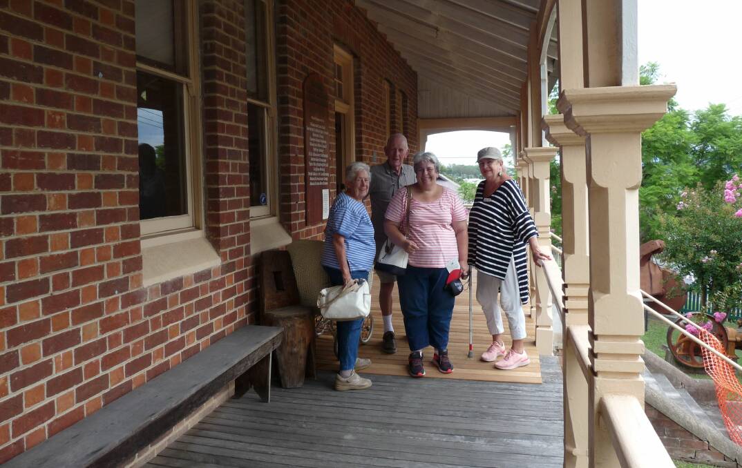 Safety first: This bus group of people from Laurieton were the first guests to use the recently constructed ramp to enter the Historical Museum.