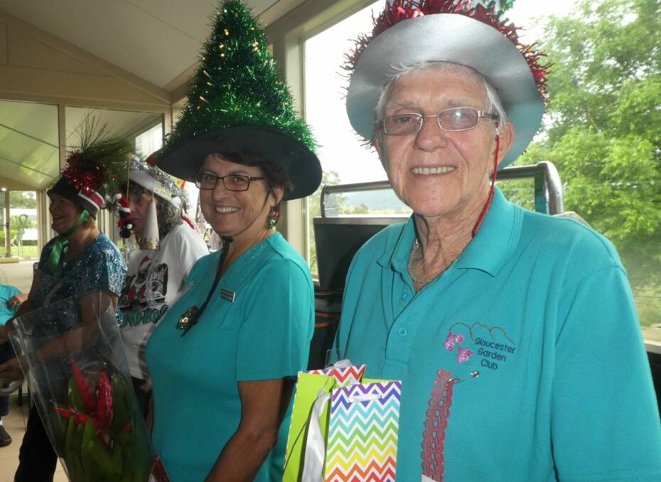 Festive: Christmas Hat Parade with the winners Anne Williamson and Robert Mendham.