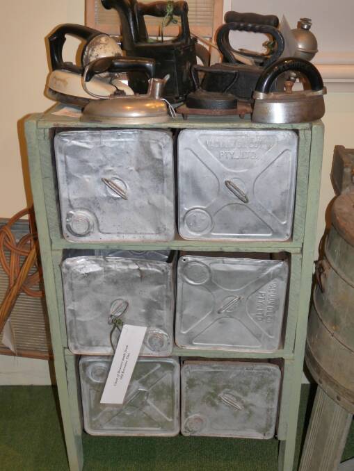 Multi-use: Kerosene tins double as a chest of drawers, on display at the Gloucester Historical Museum. Photo supplied.