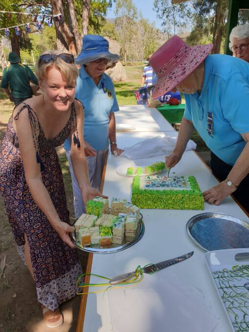 Yum: CWA ladies serve up the traditional Australia Day cake.