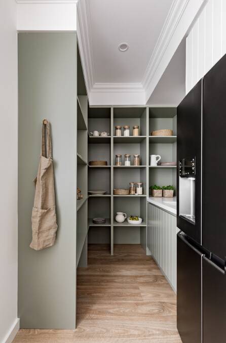 Butler anyone?: Now this is a walk-in pantry worthy of a mansion with loads of storage and plenty of room for meal preparation. The French door fridge is near the entrance for easy kitchen accessability.