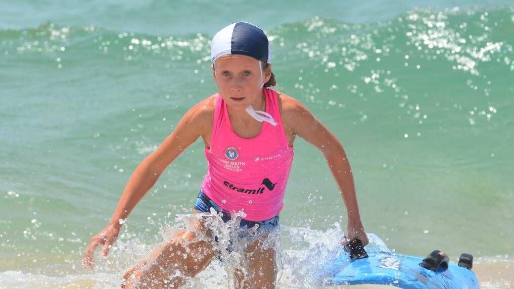 One to watch - Young South West Rocks athlete Cleo Schubert competing in the board race at last year's NSW Surf Life Saving Country Championships. Photo: Penny Tamblyn.