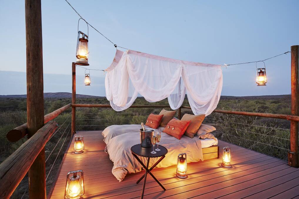 Silence: Fall asleep surrounded only by flickering lanterns at South Africa's Sanctuary Makanyane Safari Lodge.