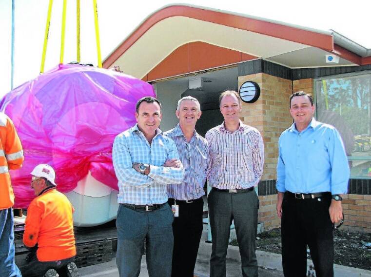 April 2013: CEO of Healthe Care Australia Steve Atkins, Mayo Private Hospital CEO Brett Goods, and Martin Cox and Nathan McKinnon of Mid North Coast Diagnostic Imaging at the installation of the Mayo’s MRI scanner.