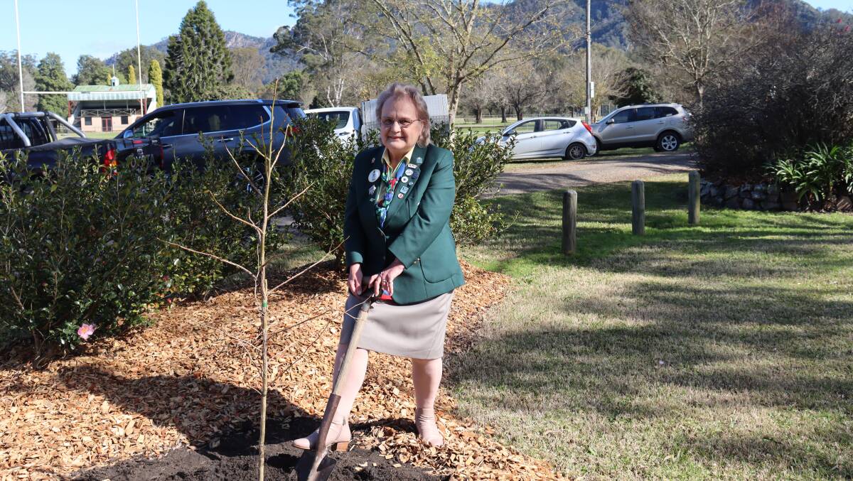 Denise Bruce planting a tree was one of her first official functions as District Governor of Lions. 