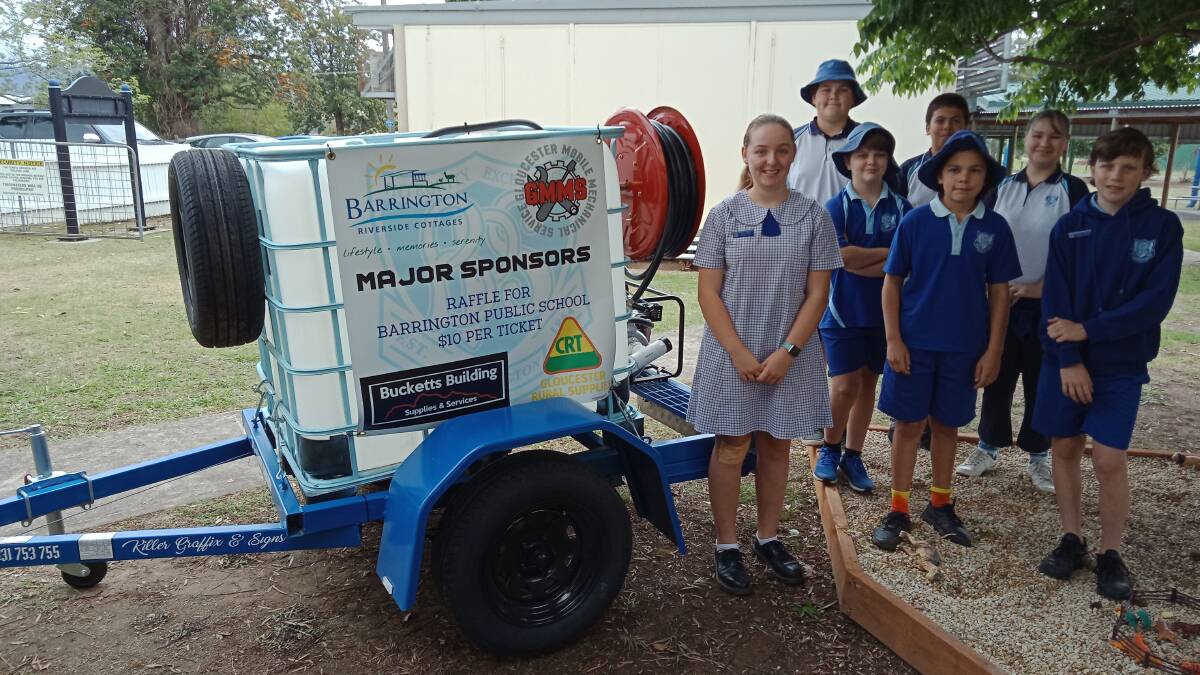 Barrington Public School year six students, with the donated trailer used to raise funds, some of which went to Bobin Public School. Photo: supplied