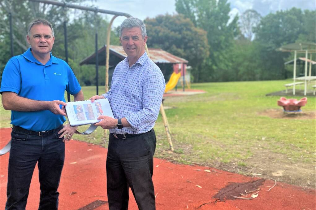Federal Member for Lyne Dr David Gillespie with MidCoast Council's Peter Kennewell looking at plans for the new playground at King George V Park. Picture: supplied