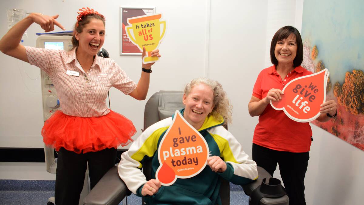 Important message: Nicole Wilding and Gilly Paxton from Australian Red Cross Lifeblood in Taree, with donor Penny Schubert. Photo: Scott Calvin