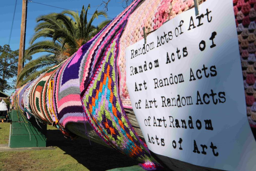 "Wingham's Biggest Knitting Needle": Textile artist Sam Everett transformed the Big Log in Central Park with yarn bombing. Photo: courtesy Manning Valley Creative Collective.