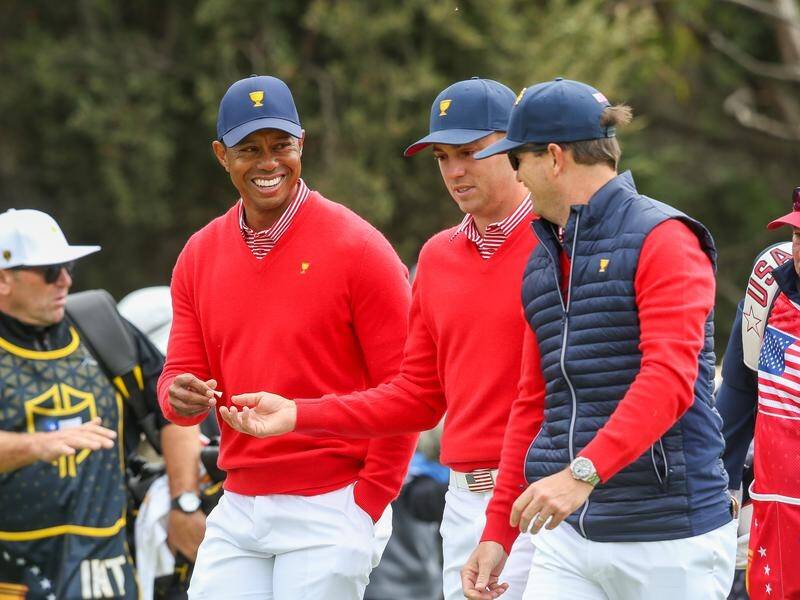 Tiger Woods says his US team are all fired up and ready to overturn the early Presidents Cup deficit