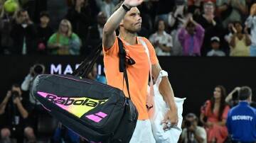 Rafael Nadal leaves the Australian Open court after his last match on tour, 11 months ago. (Lukas Coch/AAP PHOTOS)