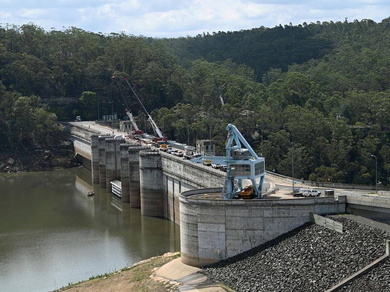 IAG has decided to pull back from the company's initial support for raising the Warragamba Dam wall.