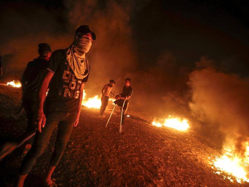 Hamas-backed activists have launched night-time protests along the Israeli border.