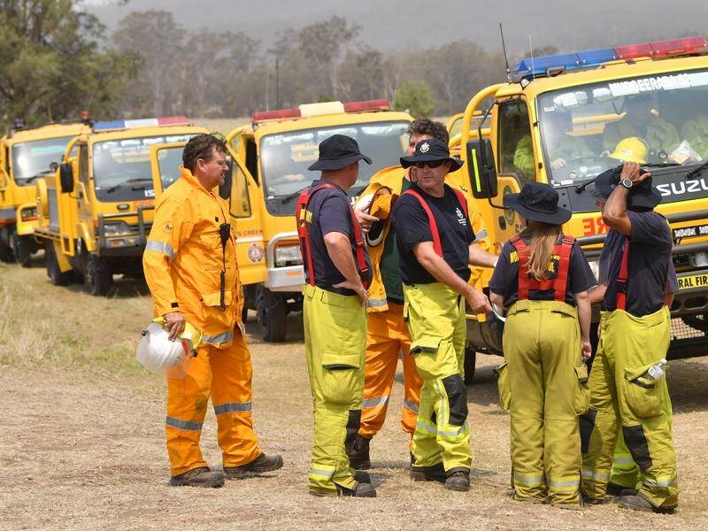 Firefighters are working to contain 70 fires across Queensland before the threat intensifies Friday.