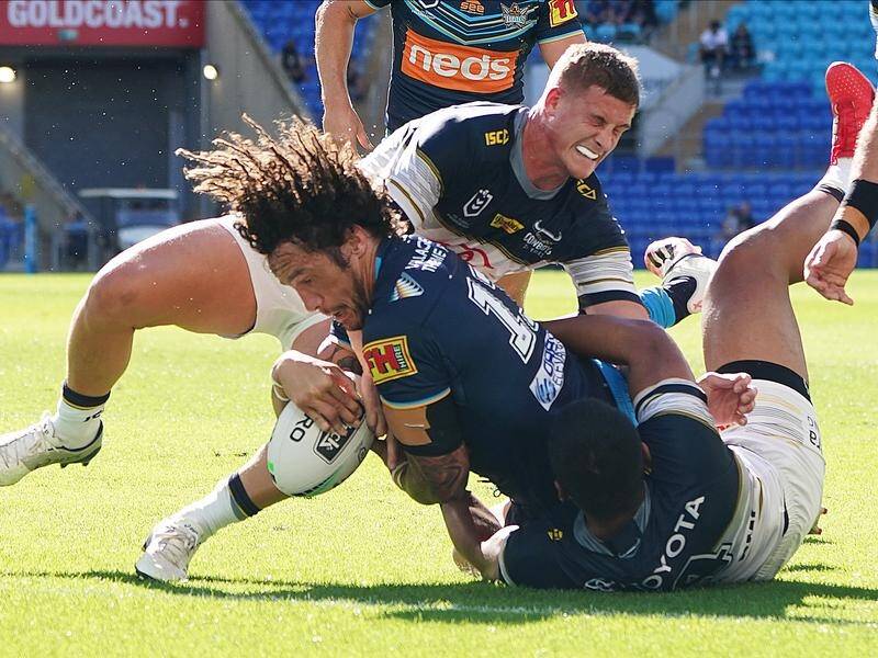 Kevin Proctor, who scored in the Gold Coast's NRL win, senses something is building at the club.