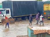 Tanzanian officials say landslides and floods have affected 1150 households in the country. (AP PHOTO)