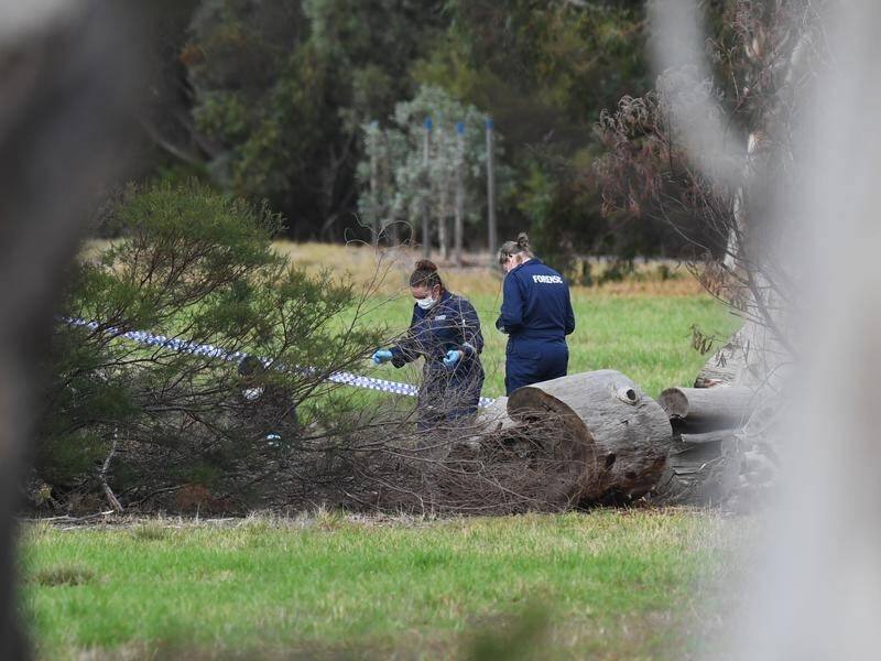 The body of a woman has been discovered by dog walkers at Royal Park in Melbourne's inner north.