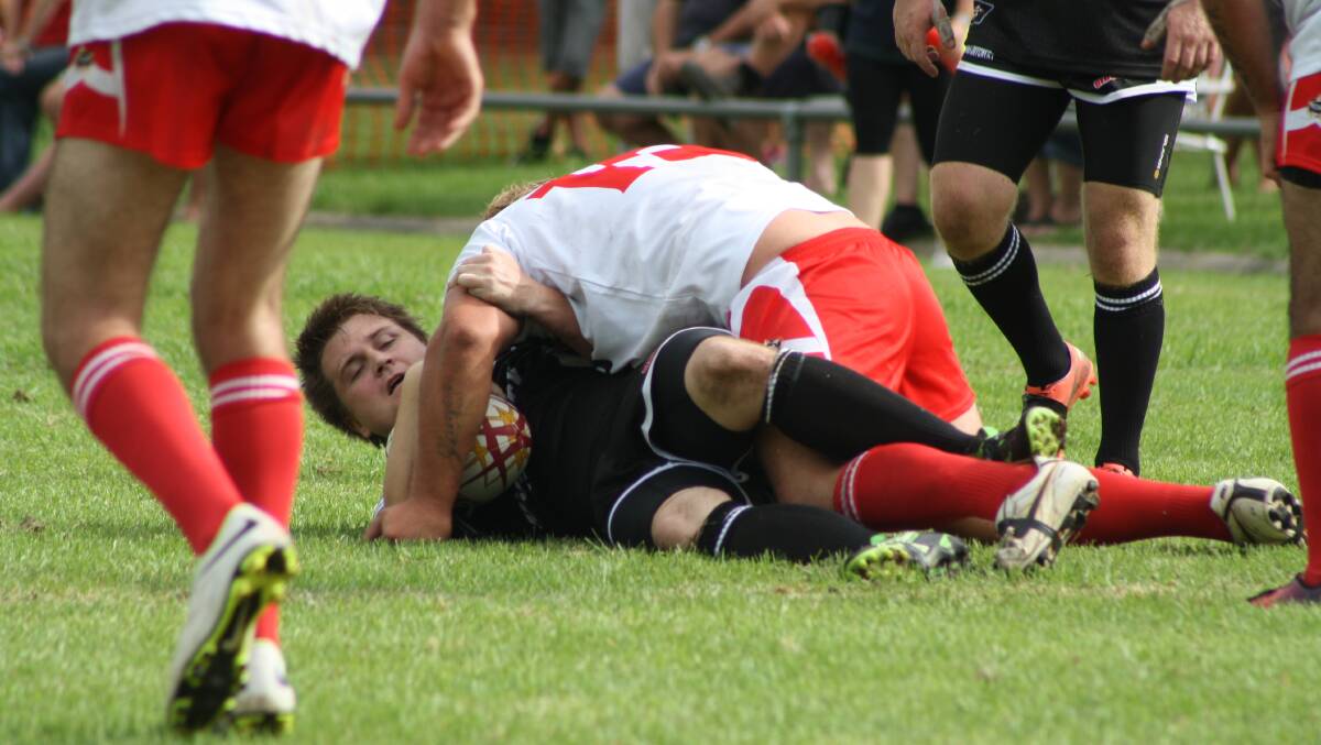 Simon Hitchcock is tackled.