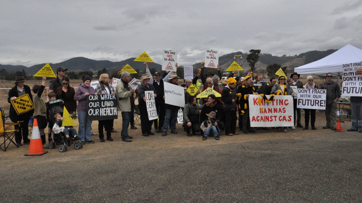 Opponents of AGL's coal seam gas operations in Gloucester at one of the company's well sites on Fairbairns Lane earlier this month.