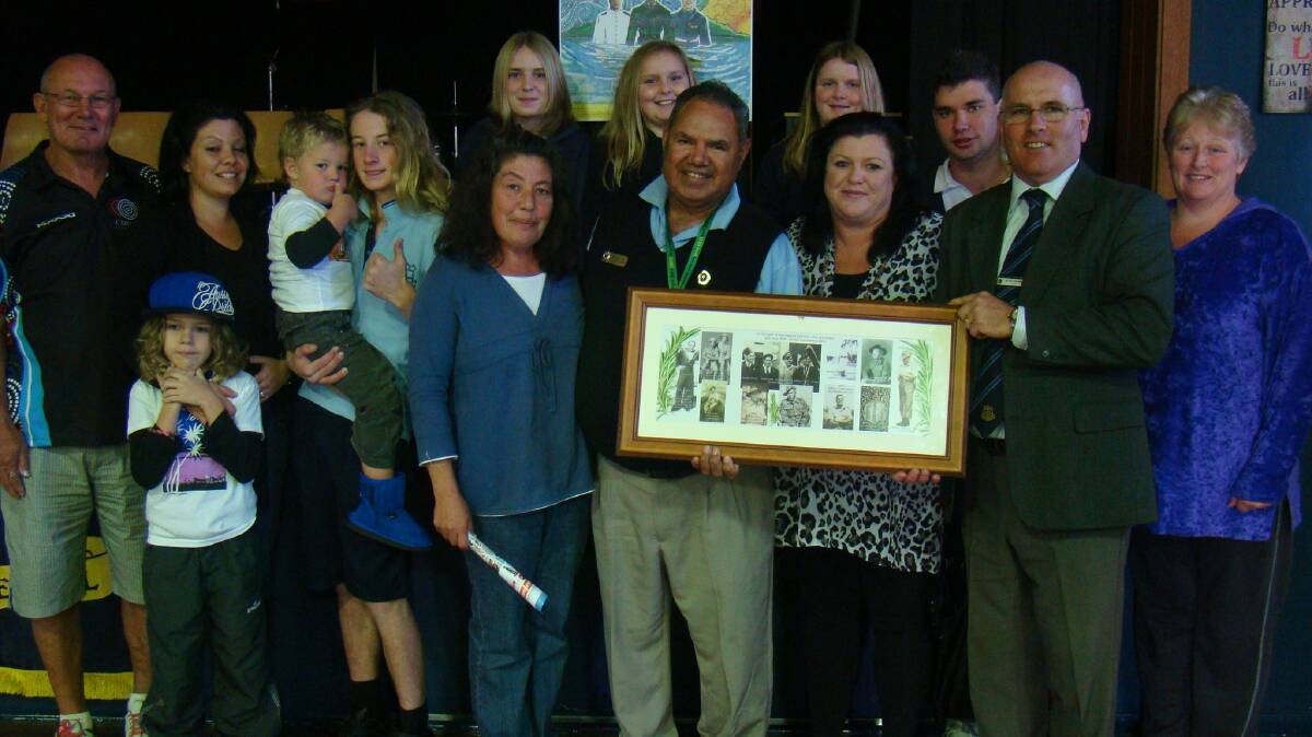Uncle Willy Paulson with Gloucester High principal Pat Cavanagh, teachers, students and parents at last week’s NAIDOC assembly at the school.