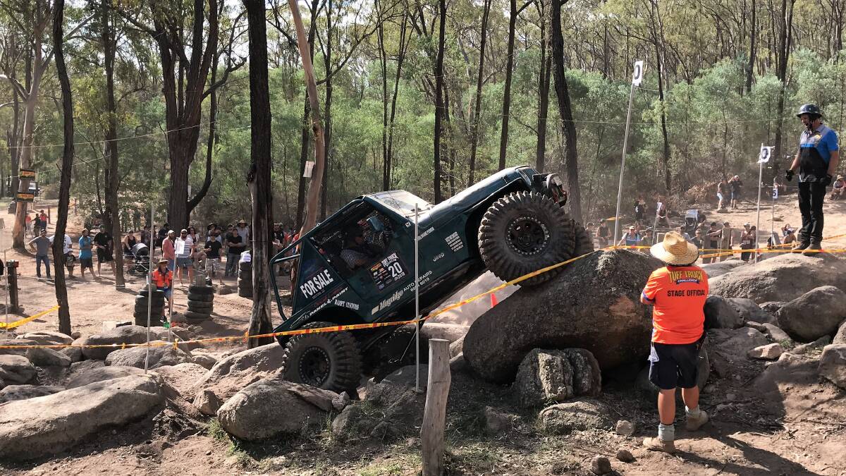 Up and over: Forster's Shane Perrim and Brian Drysdale take on rocky terrain in the 2018 Tough Dog Tuff Truck Challenge in the Hunter Valley.