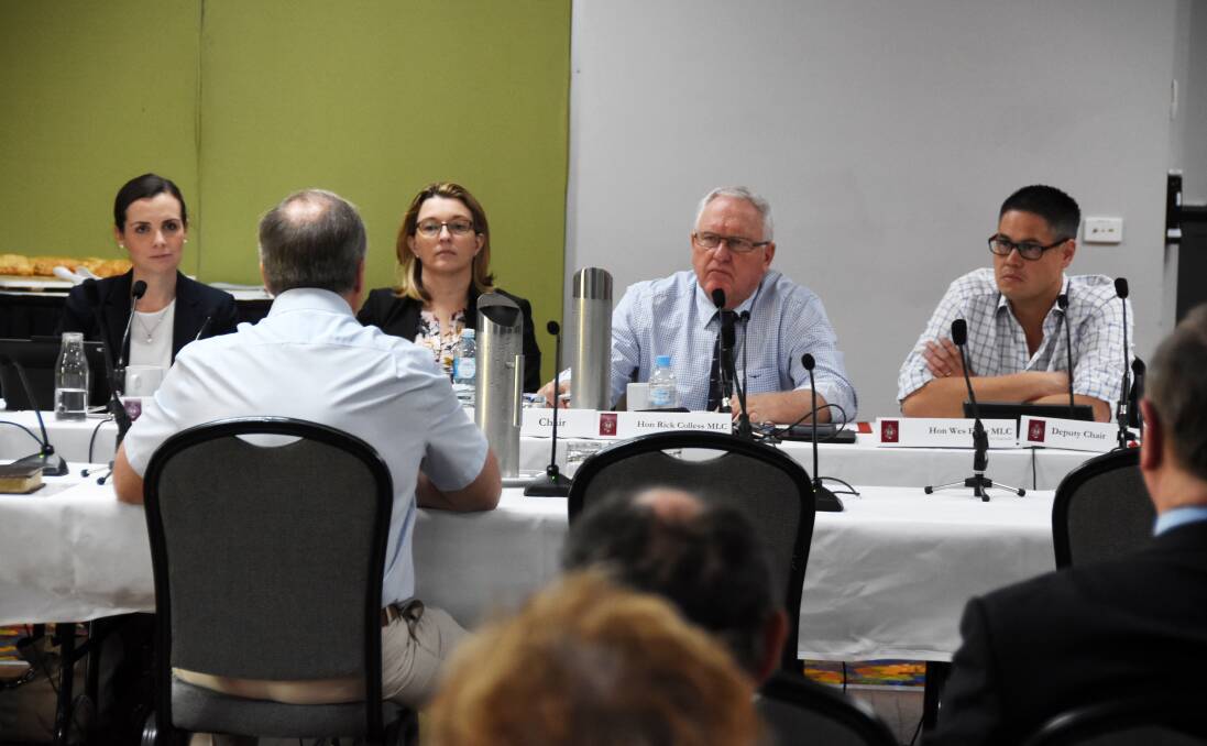 Taree Collective Bargaining Group and local dairy farmer Tim Bale address the inquiry. Photo: Scott Calvin. 