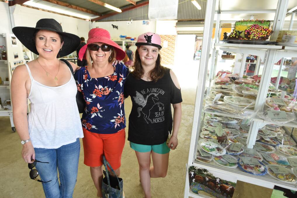 Jenny Higgs, Sarah and Angel Gray at the cakes display at this year's Gloucester Show. Photo: Scott Calvin. 