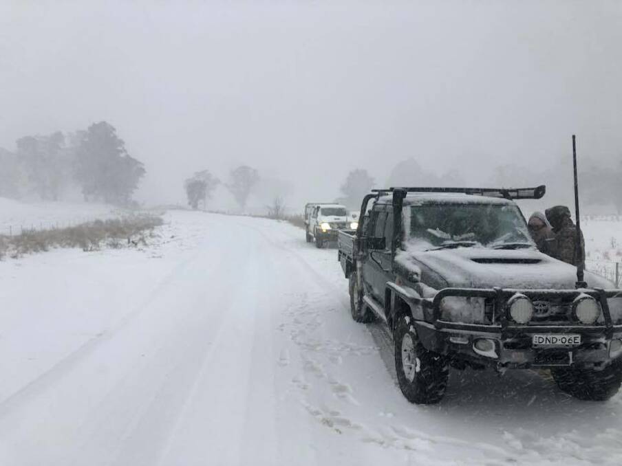 Wary drivers: Snow chasers took every precaution while travelling to the tops. Photo: Simon Burrell.