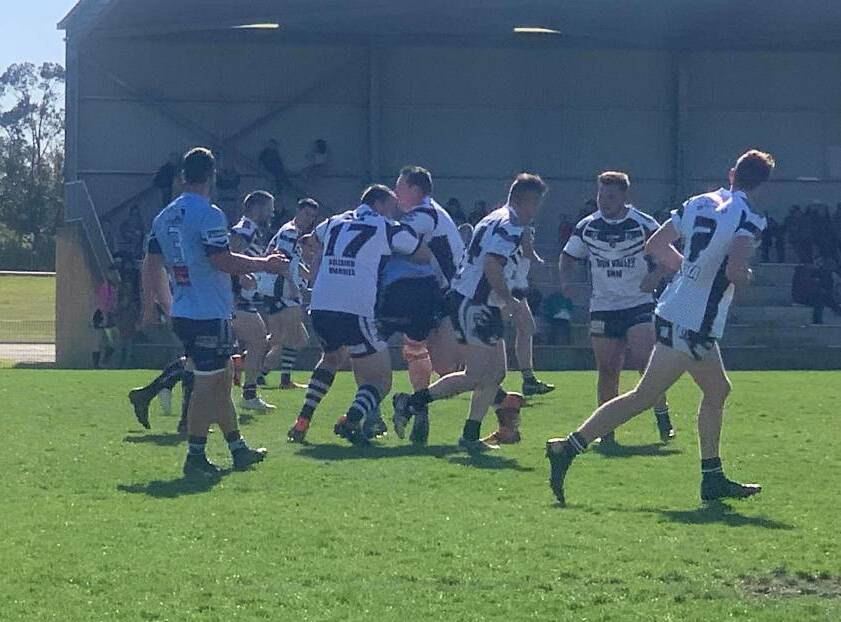 On the ball: Gloucester Magpies in action during the 2019 grand final qualifier loss to Tall Timbers. The side has resumed training for the 2020 season. Photo: Donna Summerville.