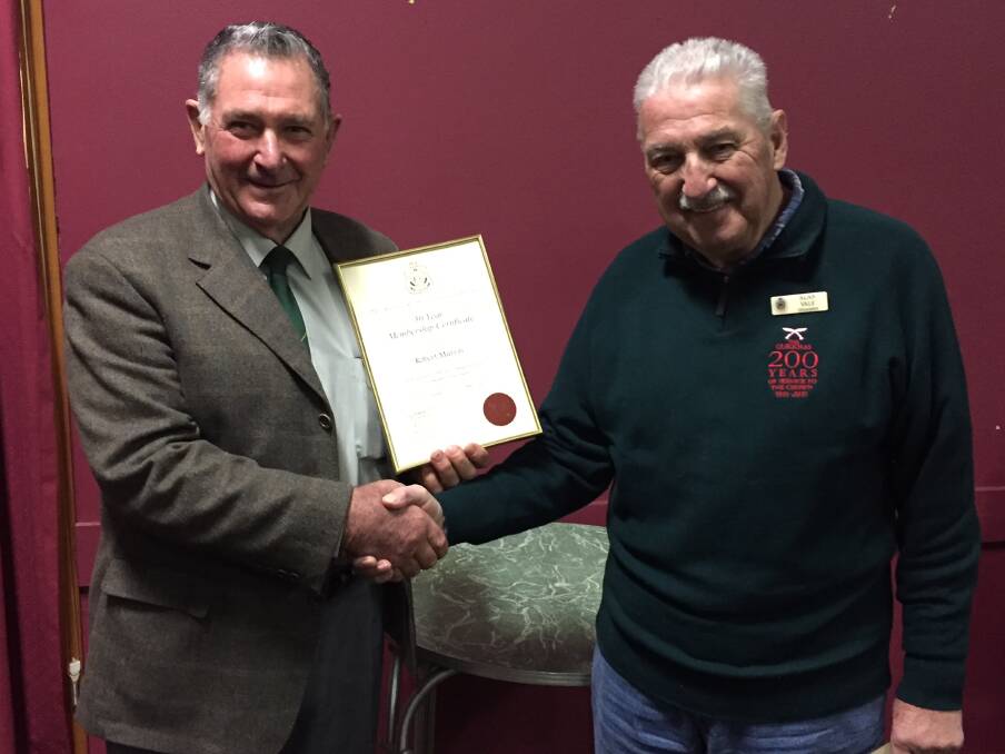 Bob Murray accepted his certificate from Gloucester RSL sub-branch president Alan Vale.
