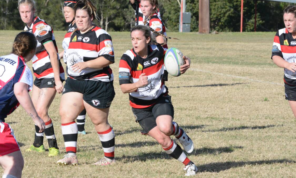 Kelly Rees takes the ball up for Gloucester in a match against Manning Ratz in June. The side takes on Wauchope in this weekend's major semi-final. Photo: Scott Calvin.