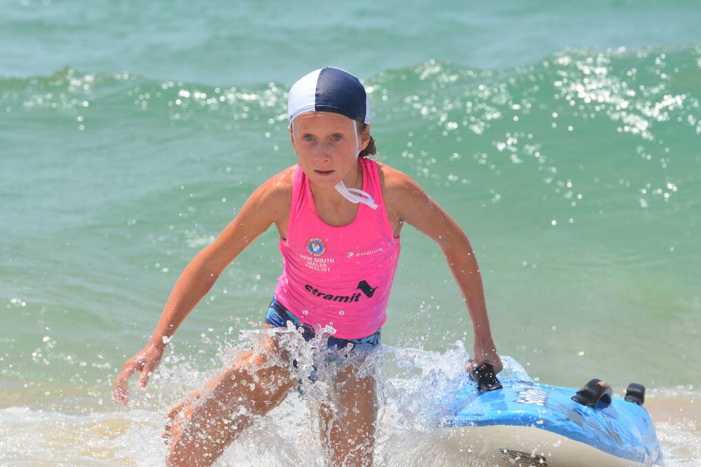 Speed: Cleo Schubert competing in the board race at last year's NSW Surf Life Saving Country Championships. Photo: Penny Tamblyn.