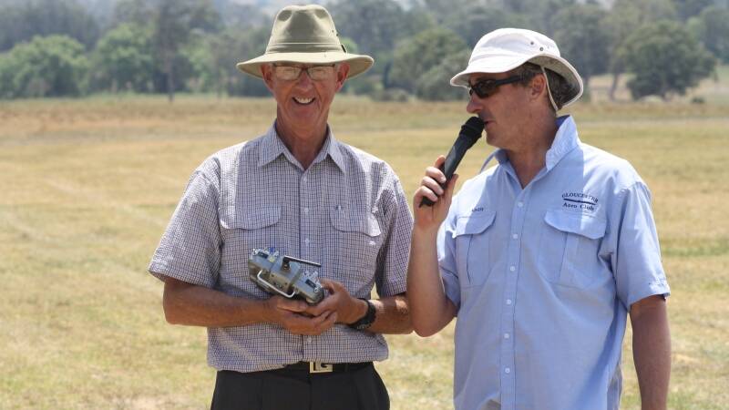 Gloucester Aero Club's Andy Edwards speaks to model pilot Peter Coles.